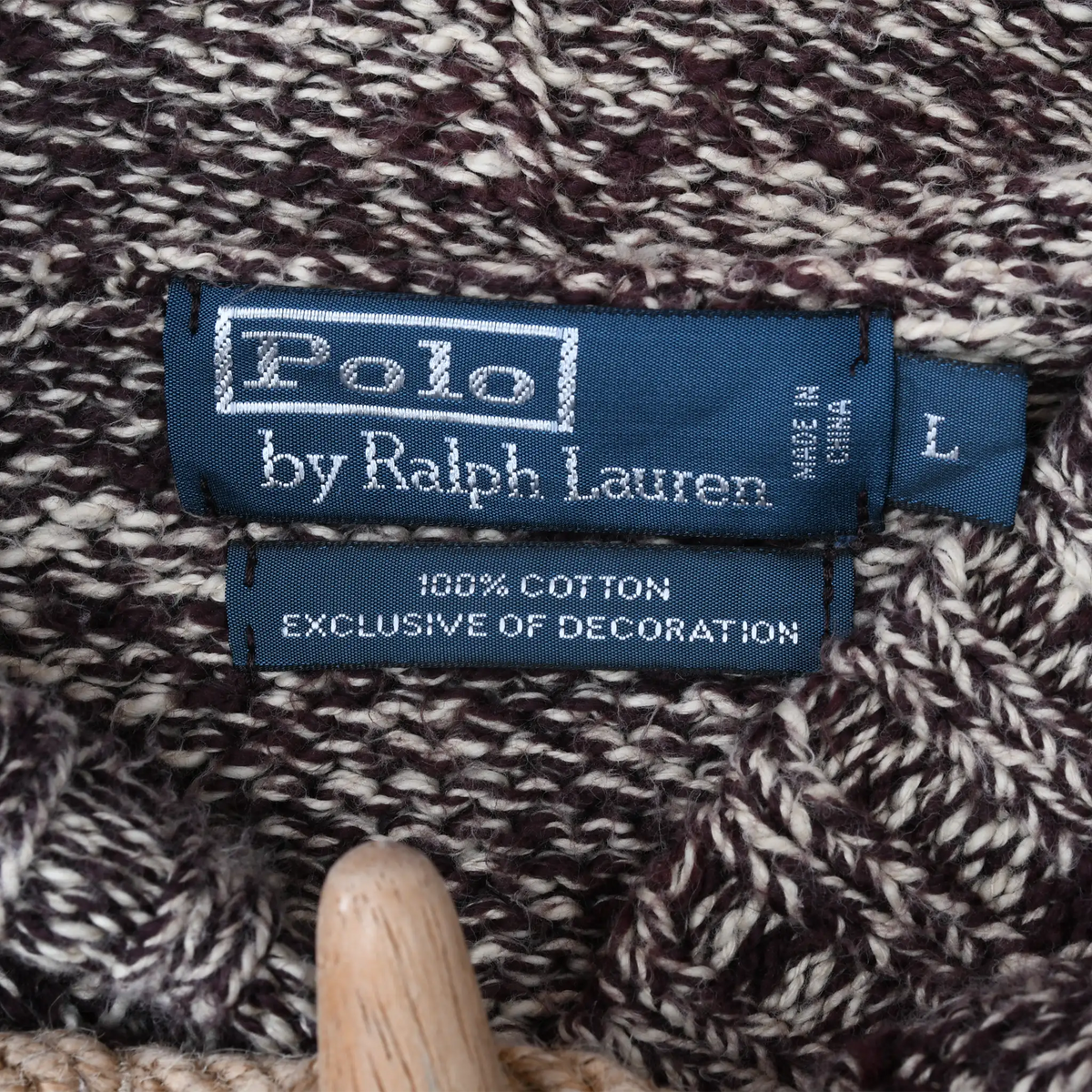 Polo by Ralph Lauren label and cotton content tag inside brown and beige marled knit sweater