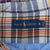 Close-up of Ralph Lauren neck label marked XL and Made in Philippines