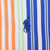 Close-up of blue Ralph Lauren pony embroidery on multicolor striped fabric