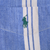 Green Polo pony embroidery on chest pocket of blue and white striped shirt