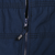Close-up of navy jacket front zipper with black Nike logo pull tab