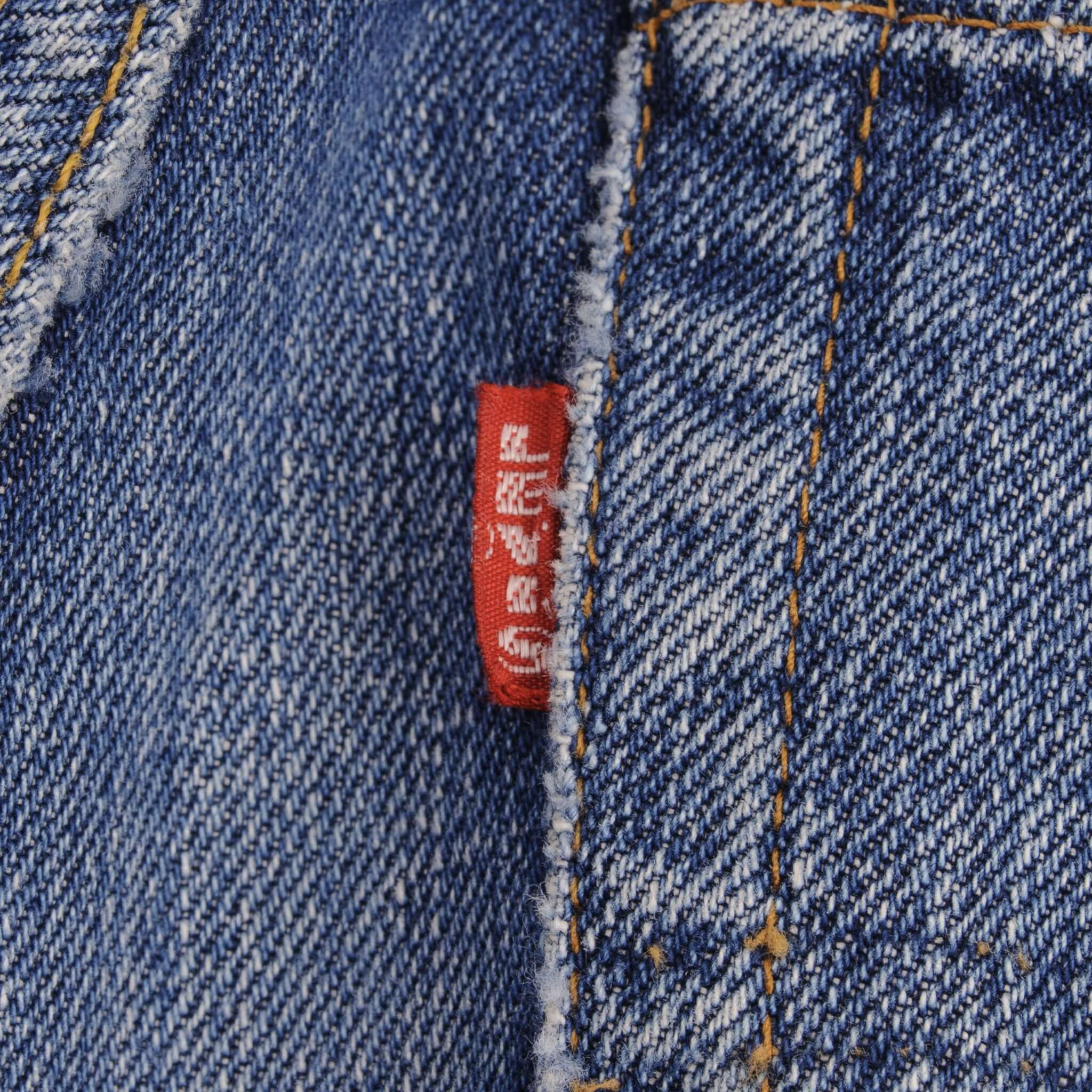 Beautiful Indigo Levis 501 Jeans with Redline and Big E 1970S Made in USA. AMAZING WASH with a medium blue wash, a nice contrast of light and medium blue with light whiskers.  SIZE ON TAG 30X31  ACTUAL Size 29x28  Back Button #6