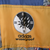 Adidas waterproof graphic printed on a yellow sleeve panel