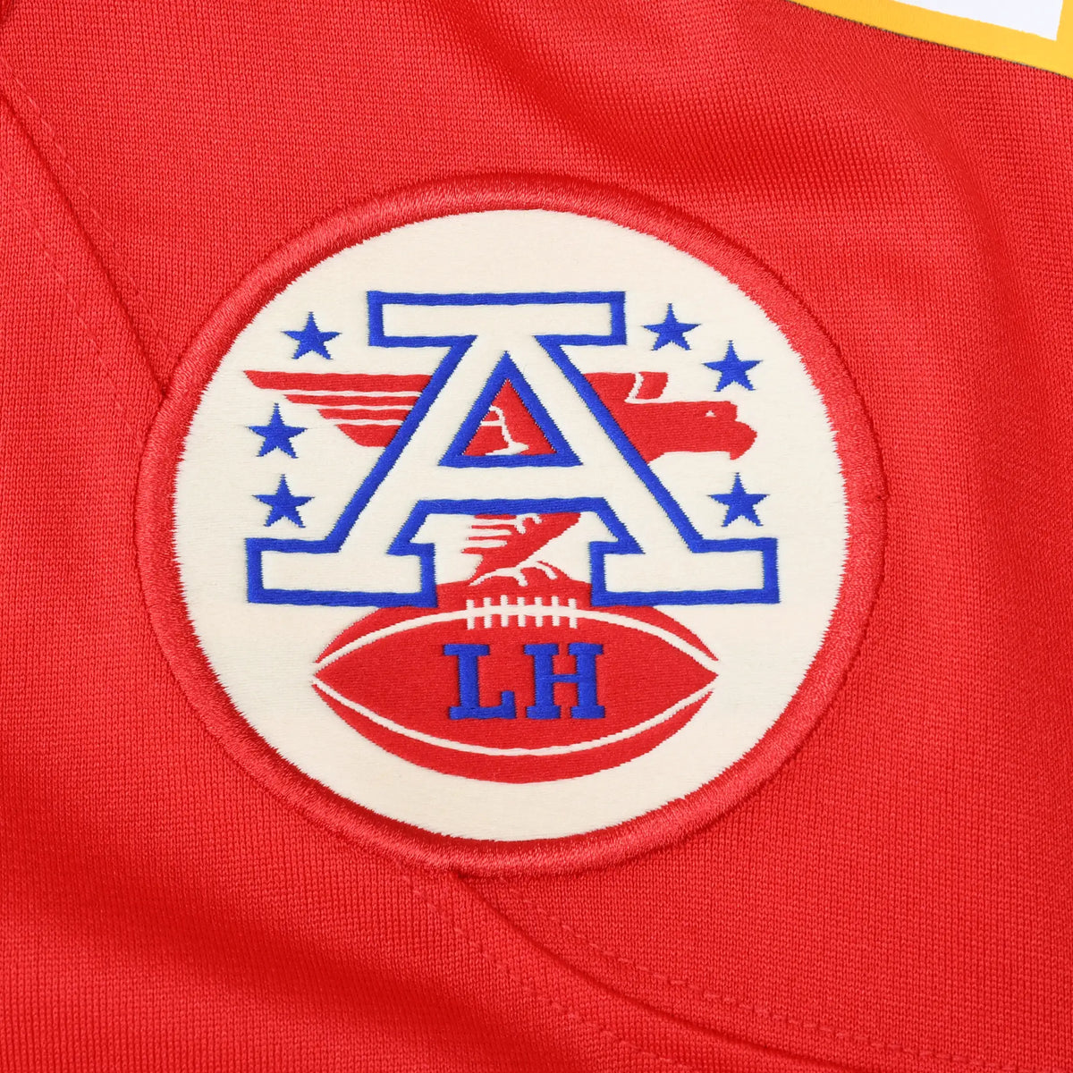 Close-up of embroidered American Football League patch on red jersey