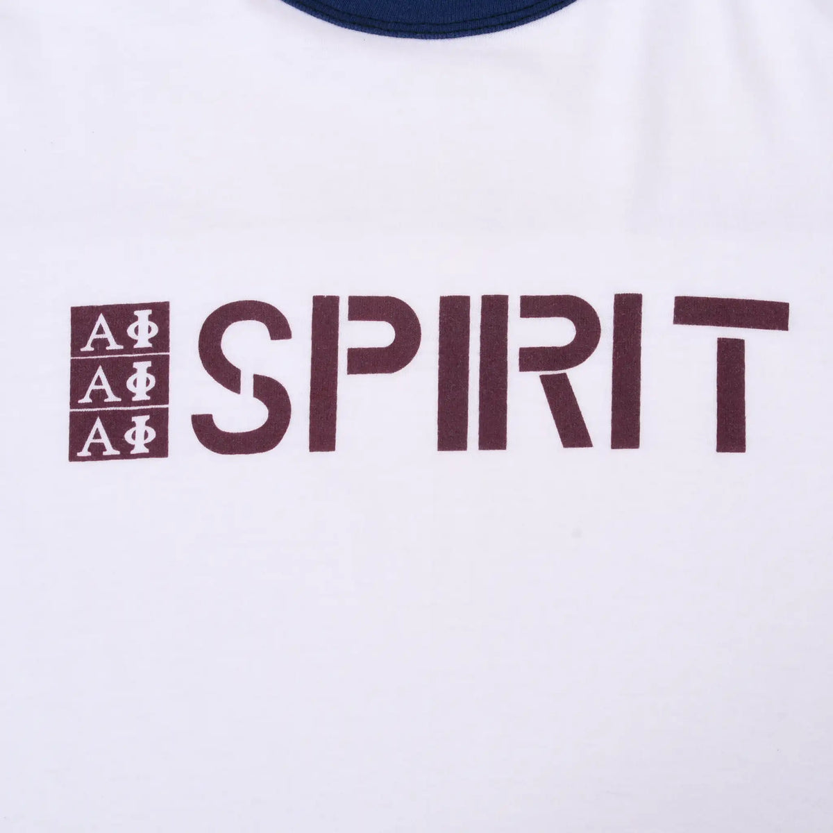 Close-up of burgundy Alpha Phi symbols and Spirit chest print on white fabric