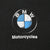 Close-up of blue and white BMW roundel and Motorcycles chest print