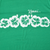 Close-up of white Kauai script and hibiscus flower print on green T-shirt