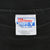 Close-up of Hanes Beefy-T neck label marked adult XL