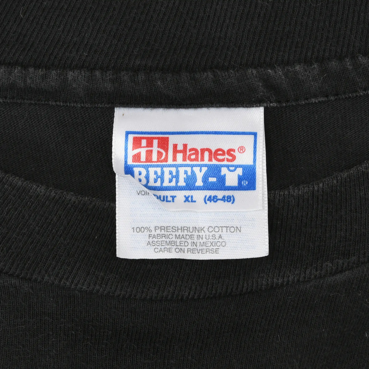Close-up of Hanes Beefy-T neck label marked adult XL