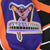 Close-up of Wachovia Spectrum embroidered shoulder patch on purple jersey panel
