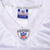 Reebok NFL neck label and Equipment NFL shield on white jersey collar