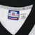 Reebok NFL Equipment neck label and XXL size print inside white jersey