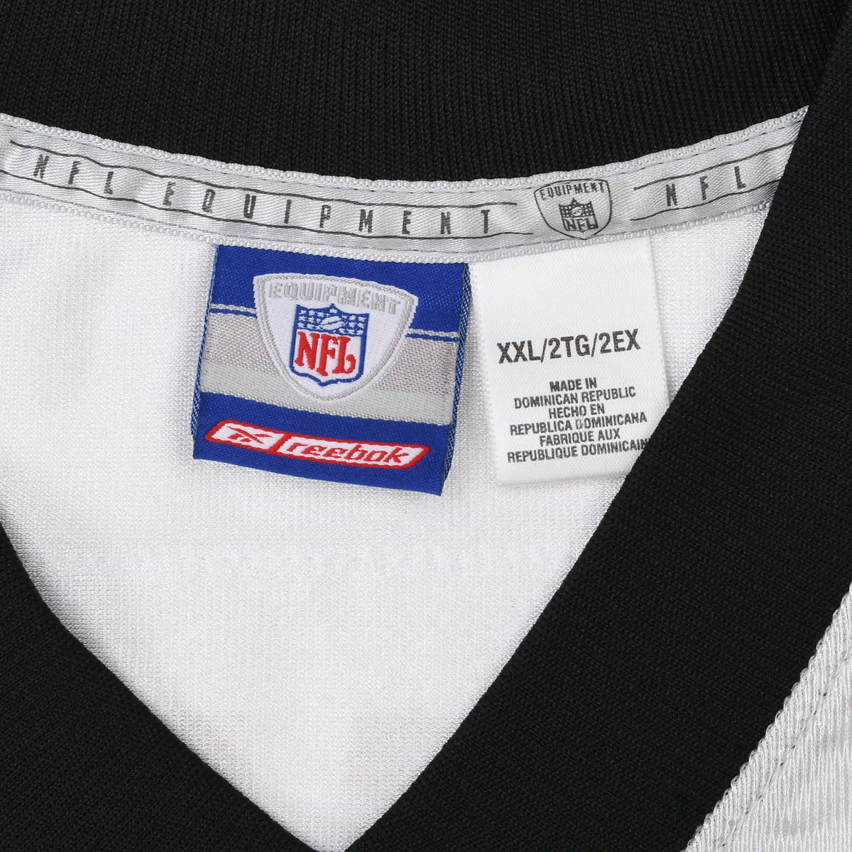 Reebok NFL Equipment neck label and XXL size print inside white jersey