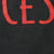 Close-up of small Belief Rose Inc. 1996 copyright text beneath red print