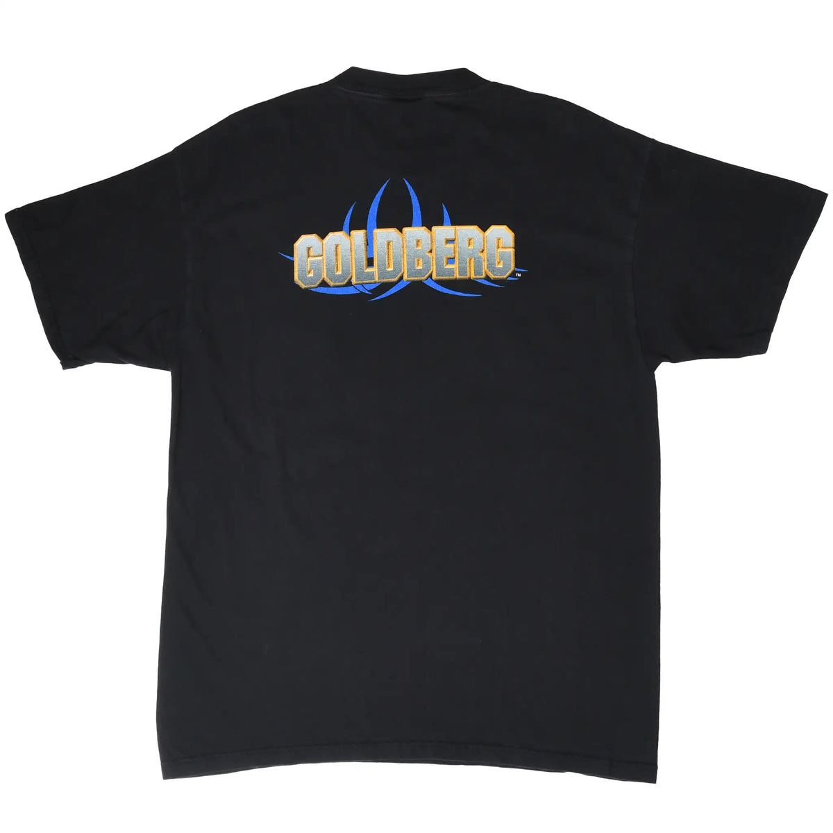 Back of black WCW T-shirt with Goldberg name graphic in gold and gray over a blue design