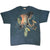 Full front view of blue-gray The Mountain T-shirt with multicolor dragon graphic