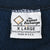 The Cotton Exchange neck label marked X Large, 50% cotton and 50% polyester, made in USA