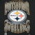 Close-up of Pittsburgh Steelers logo print with gray lettering outlined in gold
