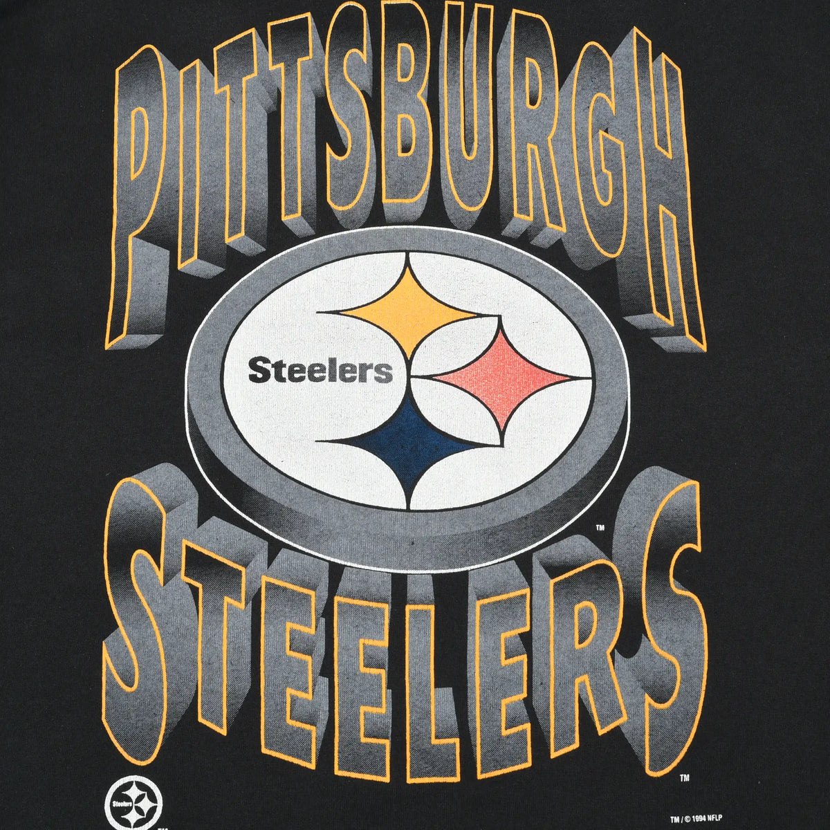Close-up of Pittsburgh Steelers logo print with gray lettering outlined in gold