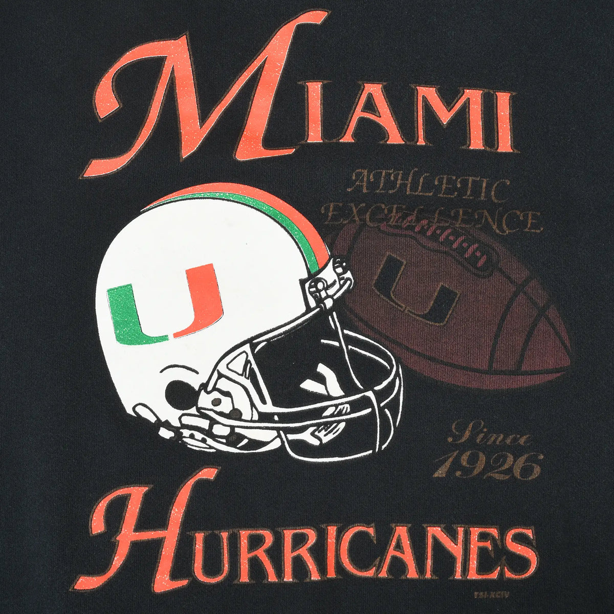 Close-up of Miami Hurricanes helmet and football front graphic