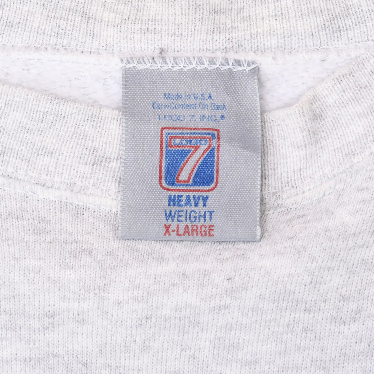 Close-up of Logo 7 Heavy Weight XL tag inside sweatshirt collar