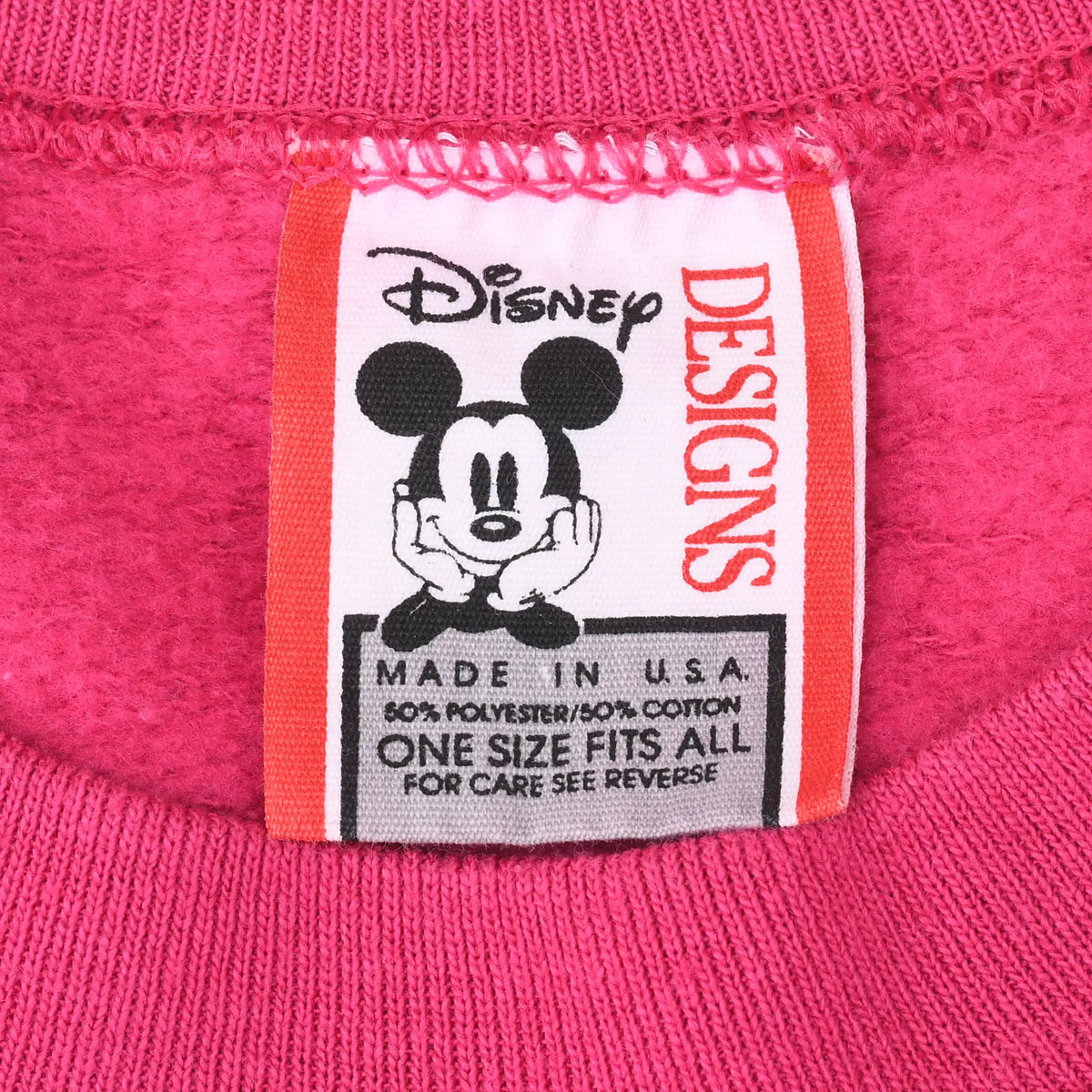 Disney Designs neck tag with Mickey Mouse and Made in USA text