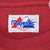 Close-up of Majestic neck label marked Made in China RN 53617