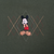 Close-up of Mickey Mouse embroidery with red, tan, and gray argyle detail