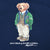 Close-up of Polo Bear graphic in green jacket on navy sweatshirt