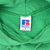 Russell Athletic neck label inside green hoodie showing medium size and Made in Mexico text