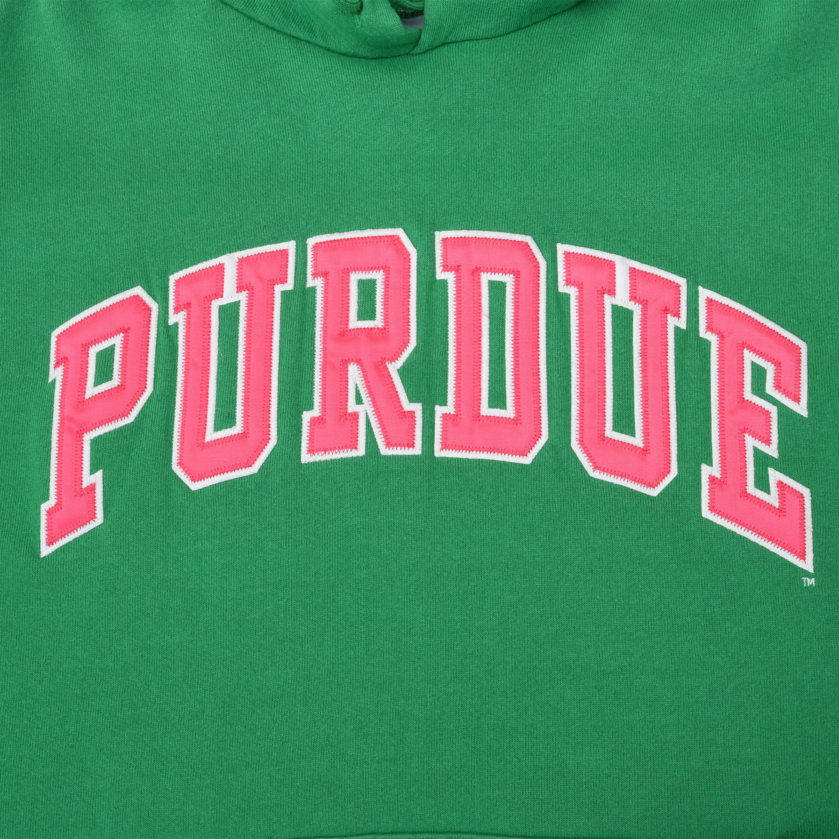 Close-up of red and white embroidered Purdue lettering on green hoodie chest