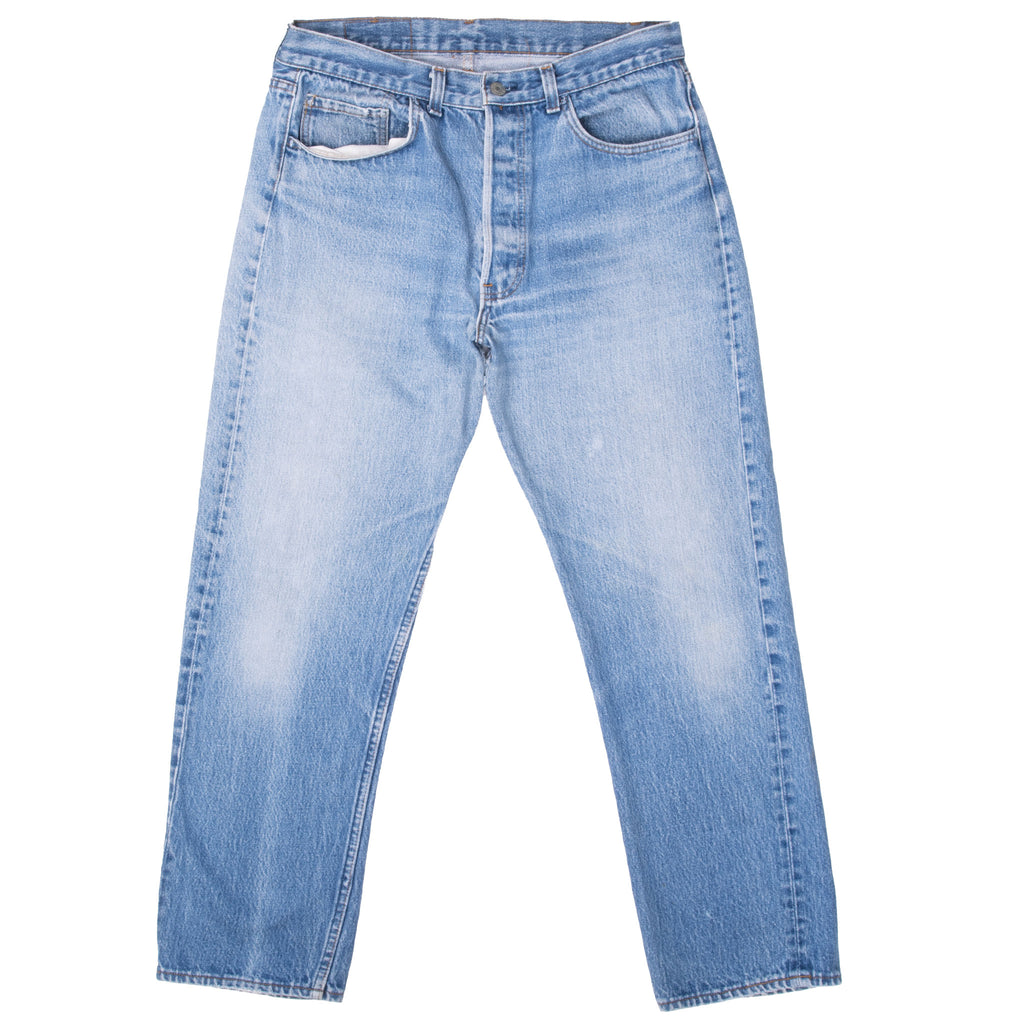 Vintage Levis 501 Indigo Blue Jeans 1980S Size 32X27 Made In Usa With A Medium Light Wash With some light Whiskers

Size on Tag 35X31 Actual Size 32X27