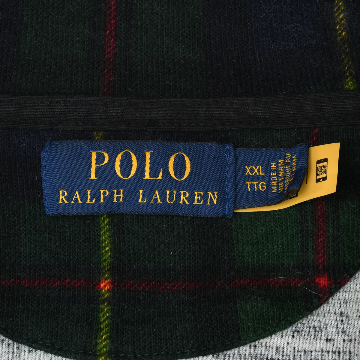 Polo Ralph Lauren XXL neck label on dark green and navy plaid fabric