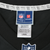 Close-up of NFL Pro Line and NFL Players neck labels on black jersey