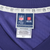 Close-up of NFL Pro Line and NFLPA neck labels marked 4XL-T