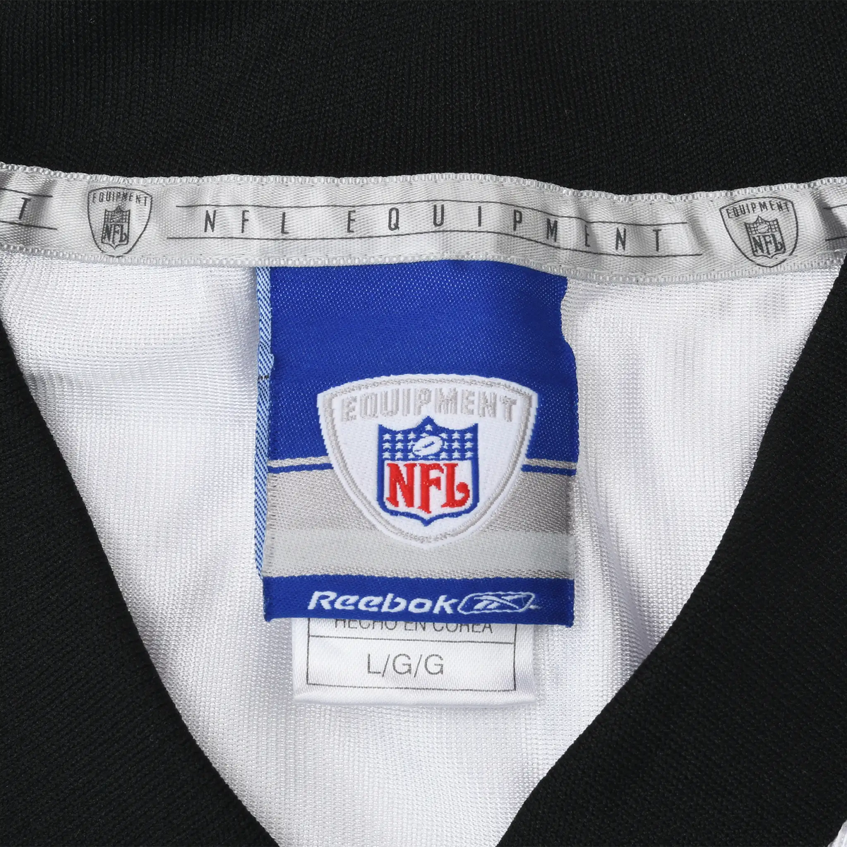 Reebok NFL Equipment neck label with L/G size tag inside jersey