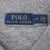 Polo Ralph Lauren neck label marked L/G on grey fabric