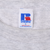 Russell Athletic neck tag marked size L and Made in U.S.A. on grey T-shirt
