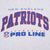 Close-up of blue and red New England Patriots Authentic NFL Pro Line chest print