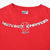 Close-up of white West Coast Choppers and Long Beach front chest graphic on red T-shirt