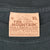 The Mountain neck label marked XL on blue-gray T-shirt