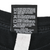 Close-up of WWE garment care label with washing instructions