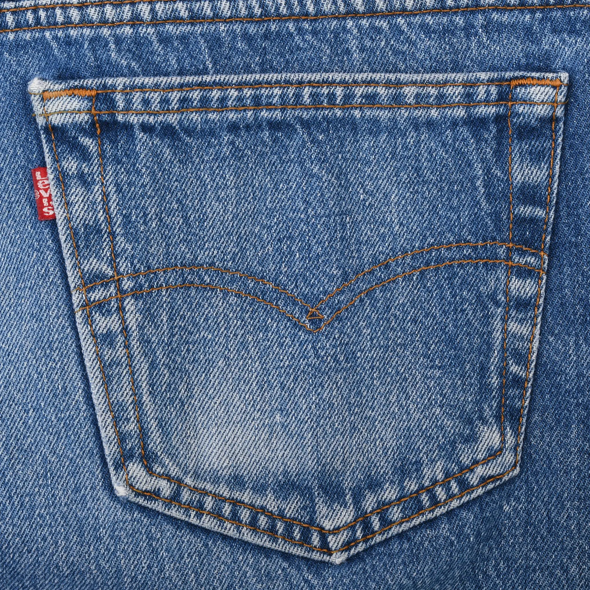 Close-up of Levi's back pocket with arcuate stitching and red tab