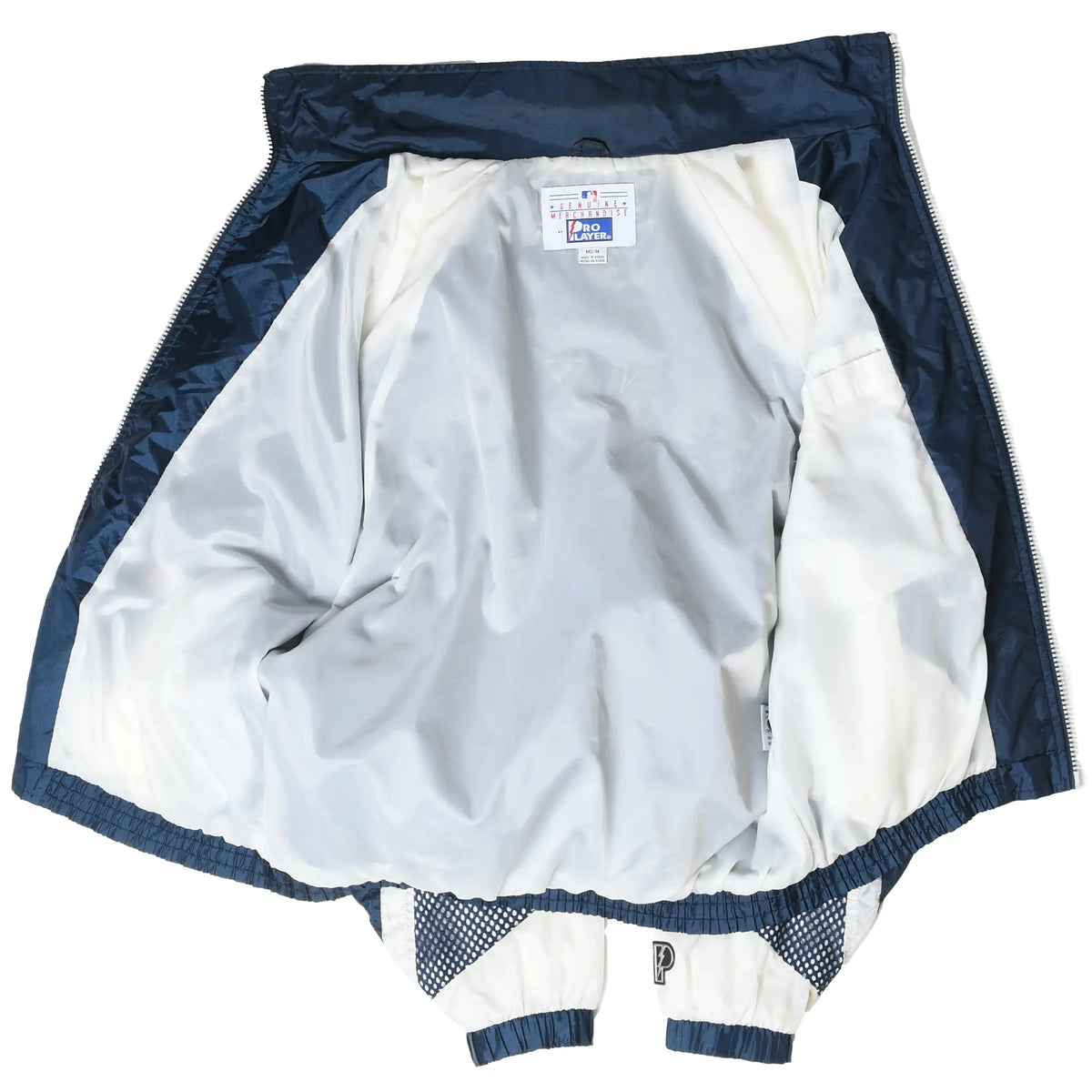 Open New York Yankees windbreaker showing the white interior lining and neck label