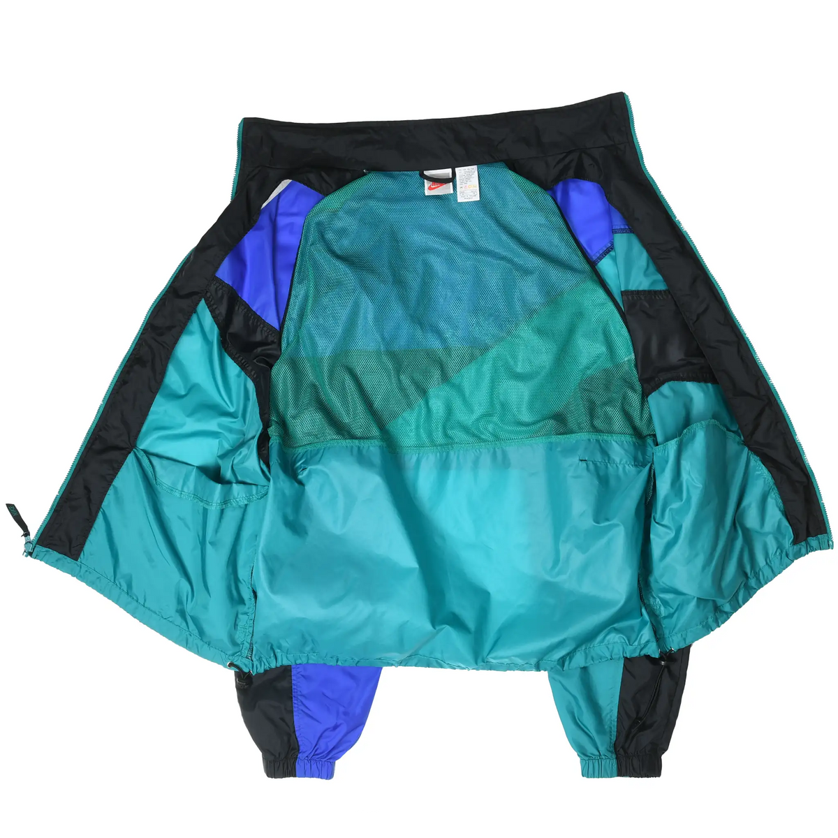 Open Nike windbreaker showing teal mesh lining and interior color-blocked panels