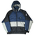 Front view of navy, black and gray Dallas Cowboys zip jacket with hood and star logo patch