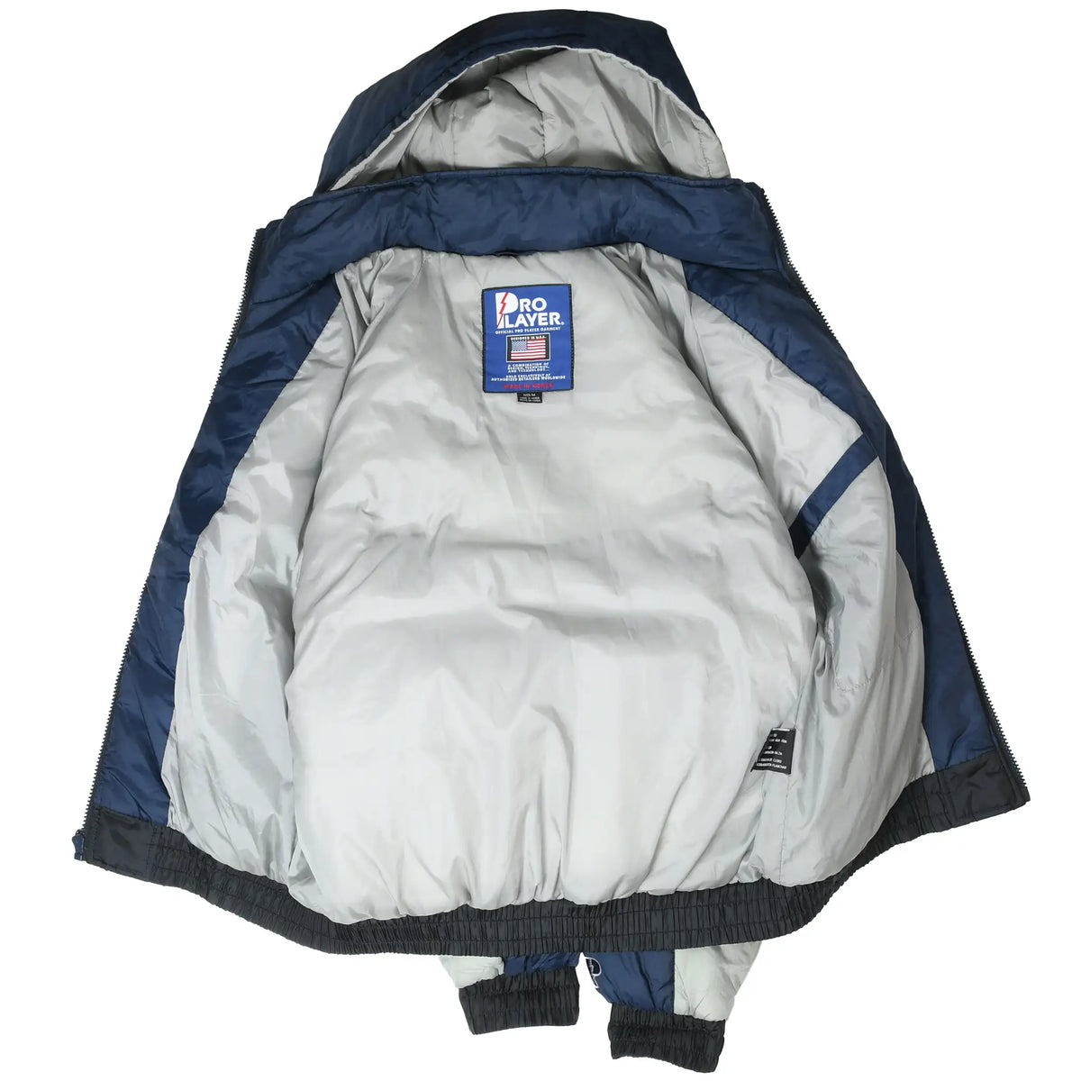 Open Dallas Cowboys jacket showing light gray lining, hood interior and Pro Player label