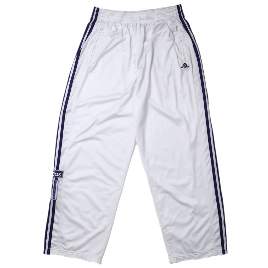 Front of white Adidas track pants with purple three-stripe trim and embroidered logo