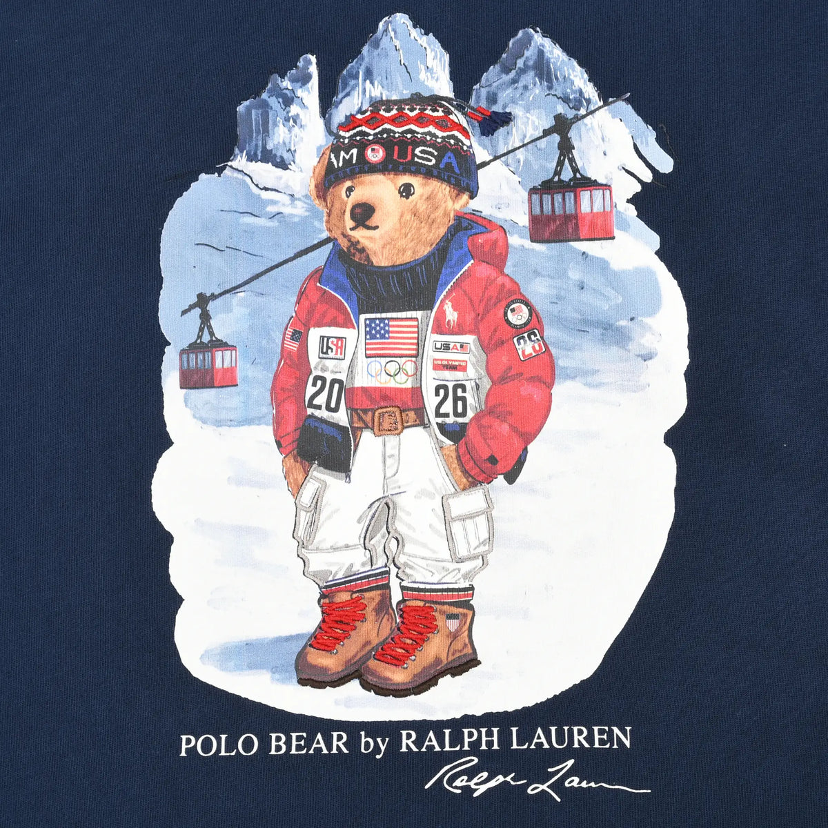 Close-up of skiing Polo Bear graphic in red jacket against snowy mountains and cable cars