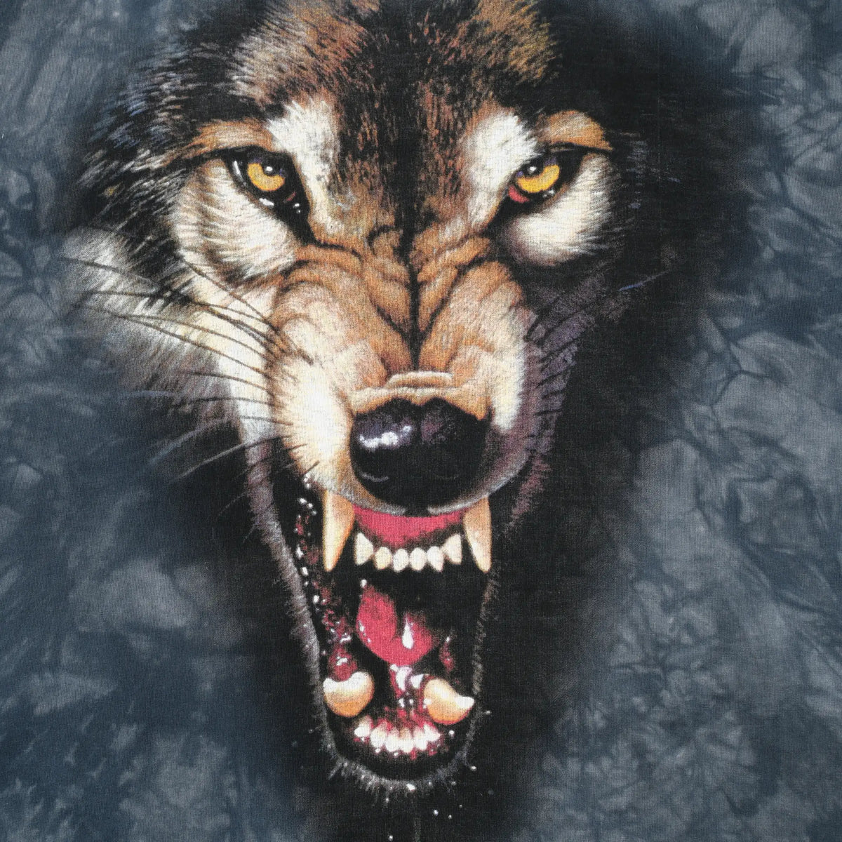 Close-up of the snarling wolf face graphic with yellow eyes and exposed teeth